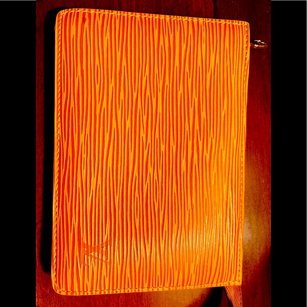 Louis Vuitton yellow ESI ladies wallet like new .